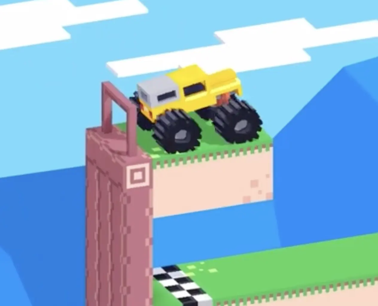 Drive Mad level 120 truck carefully edging off the upper platform before the drop