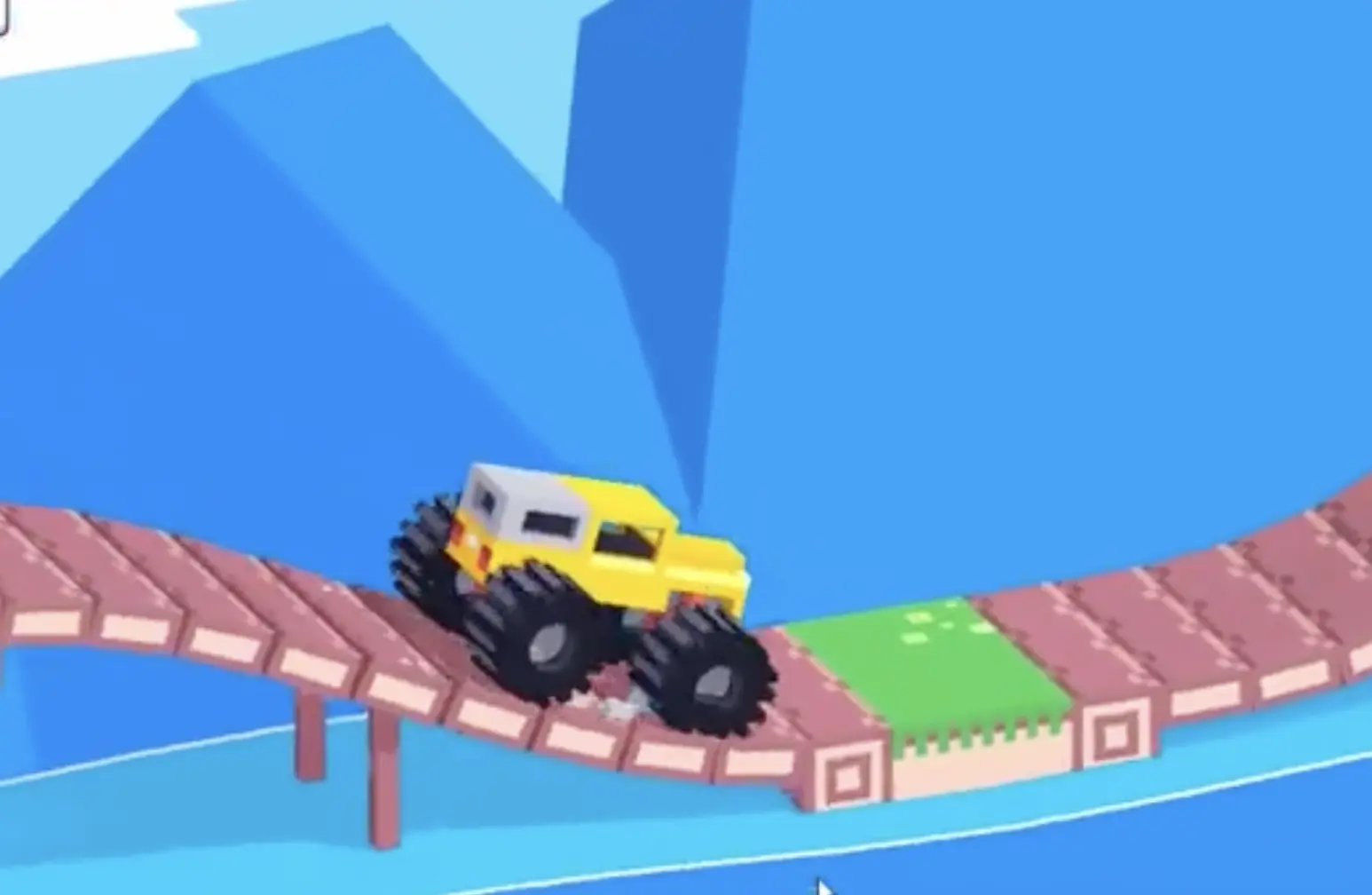 Drive Mad level 125 truck rolling through the curved ramp before the triple-hoop jump