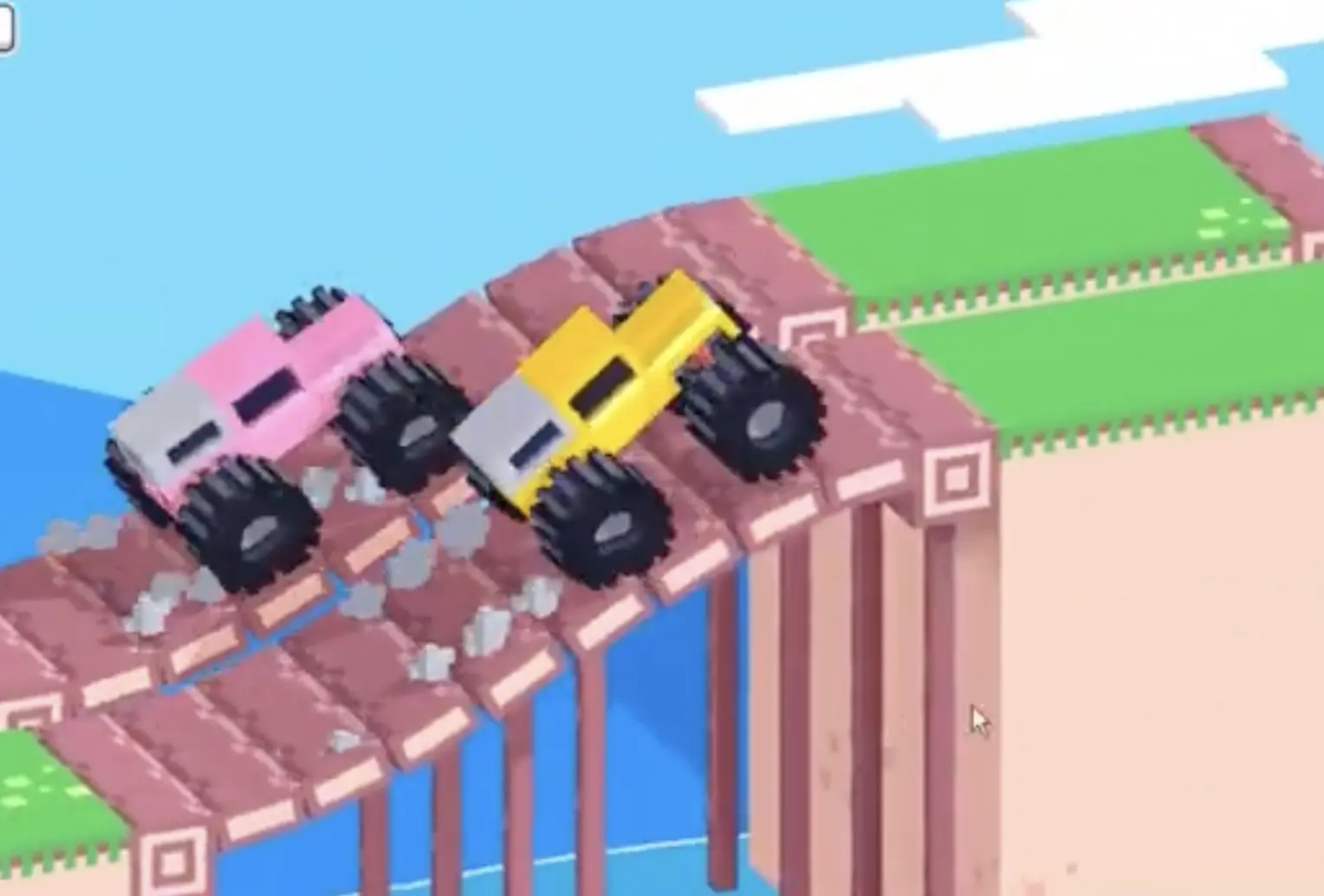 Drive Mad level 128 yellow and pink trucks cresting the upper ramp while fighting for balance