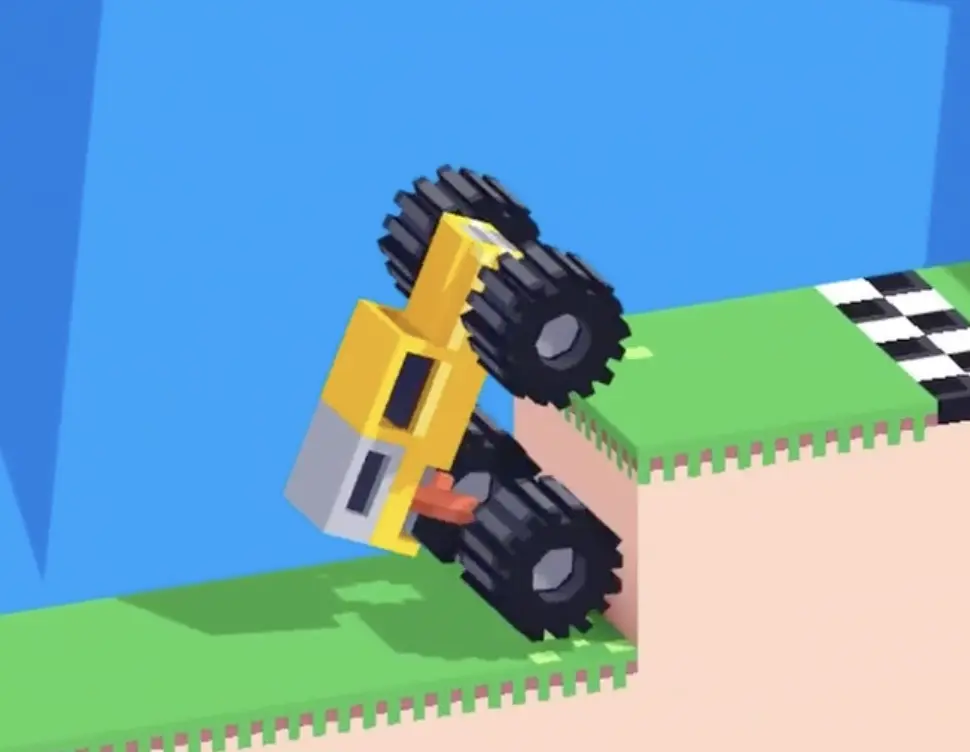 Drive Mad Level 185 truck nearly vertical with its front wheels raised while climbing the tall step