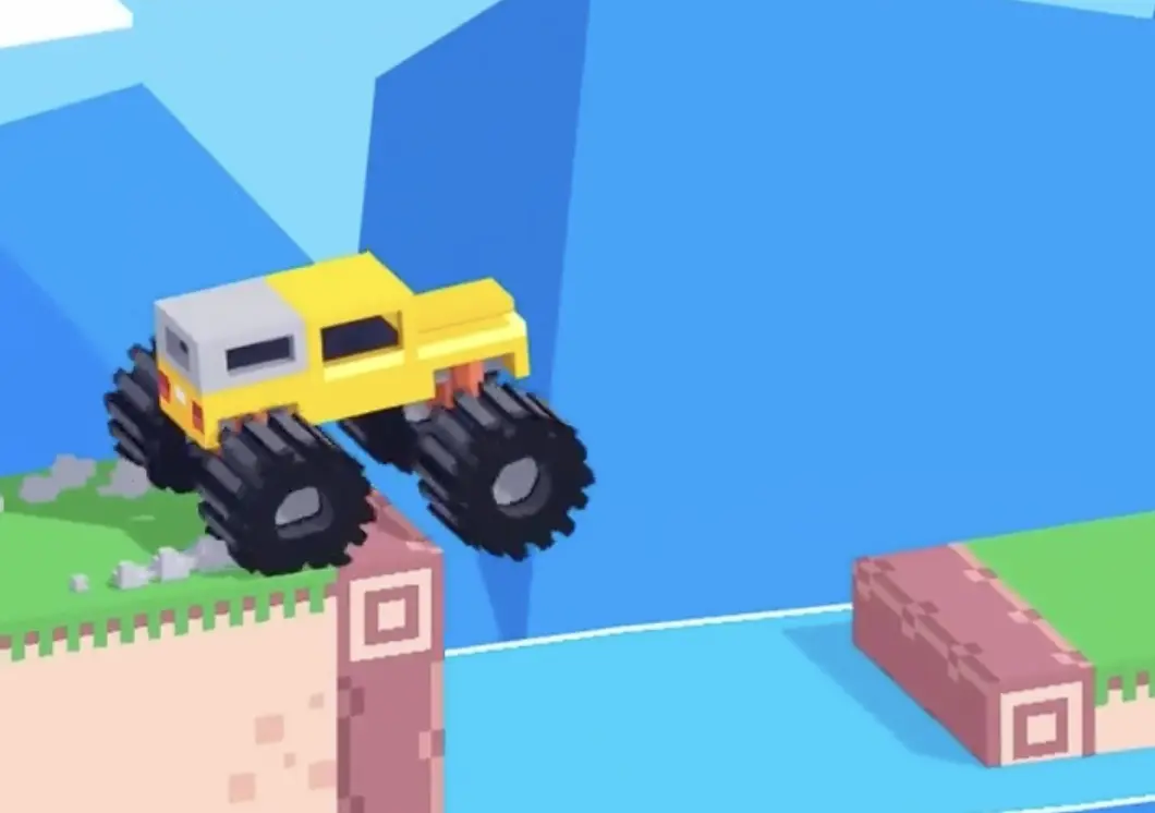 Drive Mad level 65 yellow truck jumping from the upper ledge toward the first lower platform and drainage button