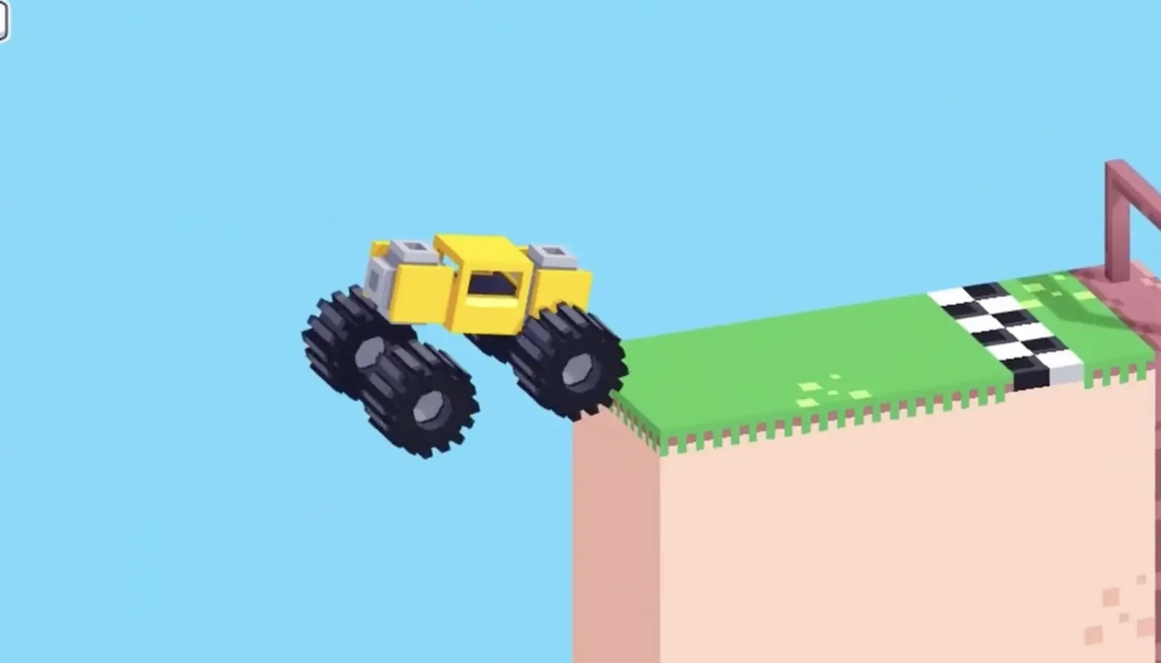 Drive Mad level 94 truck reaching the raised finish platform after flying across the gap